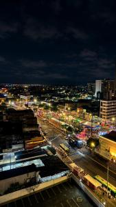 a city lit up at night with at Life Center in Caruaru