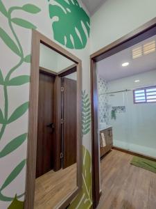 a hallway with a door in a room at Cozy Calm Refuge in Alto Boquete +43 photos