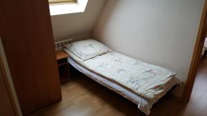 Posteľ alebo postele v izbe v ubytovaní Willa u Tomali