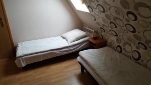 Posteľ alebo postele v izbe v ubytovaní Willa u Tomali