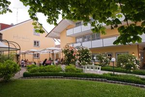 a view of the hotel from the garden at HIRSCH 1783 Hotel LANDHAUS in Langenargen