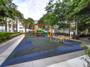 a park with a playground with a slide at Peace home B13 in Cyberjaya