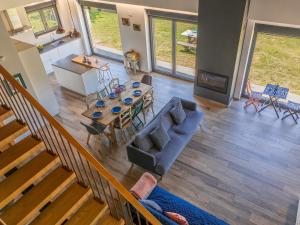 an overhead view of a living room with a table and chairs at Basque Haven by Fidalsa in Zeanuri