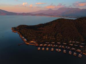 an aerial view of a harbor with boats in the water at Vedana Lagoon Resort & Spa in Hue +42 photos