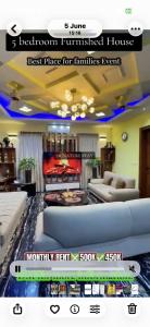a living room with a couch and a tv at Behria town phase 8 in Rawalpindi +1 photo