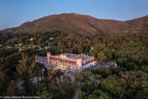 an aerial view of a large house in a forest at El Espinillo 2 in La Falda
