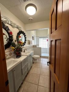 a bathroom with a sink and a toilet in it at Almost heaven beach house in Puerto Peñasco +41 photos