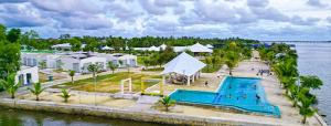 an aerial view of a resort with a swimming pool at MN Koh Kong Resort in Koh Kong