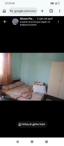 a screen shot of a picture of a bed at Vila Gega in Tale +2 photos