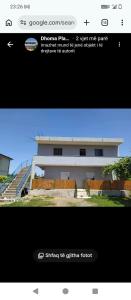 a screenshot of a picture of a building at Vila Gega in Tale