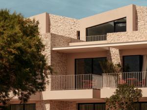a rendering of a house with balconies at Petra Mare Villas in Psathopyrgos
