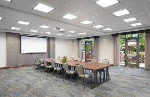 a conference room with a wooden table and chairs at Hyatt Place Columbus/OSU in Columbus +41 photos