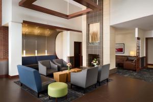 a lobby with chairs and a waiting room at Hyatt Place Columbus/OSU in Columbus