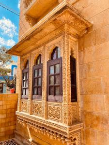 a window on the side of a building at Vedsa haveli new in Udaipur