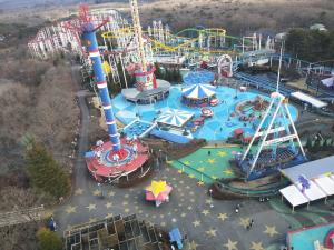 an aerial view of an amusement park with a roller coaster at ログハウス那須ハイグランド in Nasu