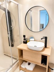 a bathroom with a sink and a shower at Boutique Hotel at Golf Piestany in Piešťany +19 photos