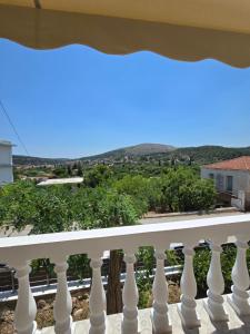 a view from the balcony of a villa at Stone House with Panoramic Views in Marmaro in Mármaron