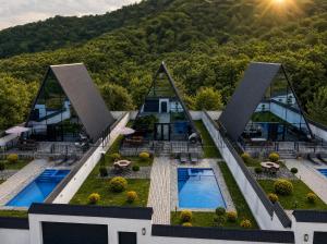an aerial view of a house with a swimming pool at Qafqaz Falcon Chalet in Gabala