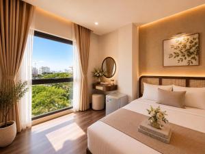 a bedroom with a bed and a large window at LAVISH OCEAN INN Đà Nẵng in Danang