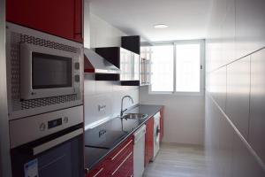 Kuchyňa alebo kuchynka v ubytovaní Apartamento Flamingo Beach