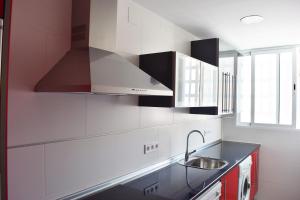 Kuchyňa alebo kuchynka v ubytovaní Apartamento Flamingo Beach
