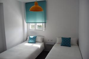 Posteľ alebo postele v izbe v ubytovaní Apartamento Flamingo Beach