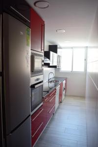 Kuchyňa alebo kuchynka v ubytovaní Apartamento Flamingo Beach