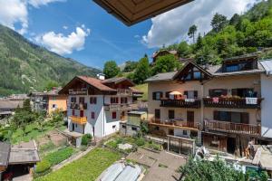 an aerial view of a village in the mountains at Casa Anna in Predazzo