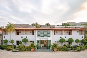 a rendering of the front of a white building at Love Rawai Hotel in Rawai Beach