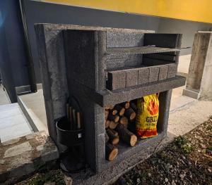 a stone oven with a bunch of food inside at Vila Dara 1924 in Tivat