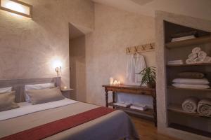 A bed or beds in a room at Villa Tamara