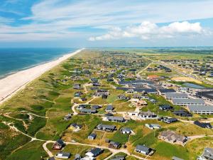 an aerial view of a beach with houses and condos at Premium apartment with loft in holiday park in Ringkøbing +78 photos