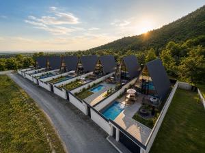 an aerial view of a building with a pool at Qafqaz Front Falcon Chalet in Gabala