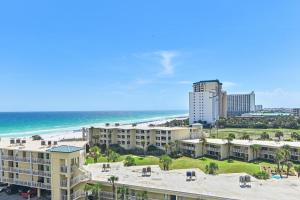 a view of a beach and buildings and the ocean at SunDestin 818 in Destin