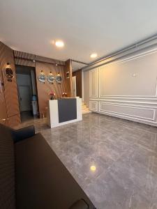 a large lobby with a table in a room at Rota Kadıköy in Istanbul
