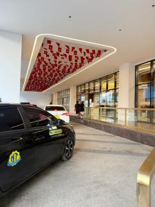 a black car parked in front of a building at Mai home in Hai Phong