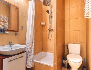 a bathroom with a toilet and a sink and a shower at Brido in Bardo +49 photos