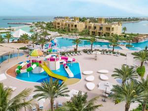 an aerial view of a water park at a resort at Sofitel Ras Al Khaimah Al Hamra Beach Resort in Ras al Khaimah