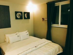 Postel nebo postele na pokoji v ubytování IDEA Hotel