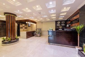 a lobby of a store with plants in it at القصر الضيافة1 in Khamis Mushayt