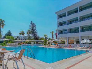 a large swimming pool in front of a hotel at Bieno Venüs Hotel - All Inclusive in Side