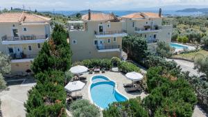 an aerial view of a villa with a swimming pool at Sunset Villa Amelia Skiathos in Skiathos National Airport