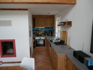 a kitchen with a sink and a stove top oven at Sonnendeck in Wustrow