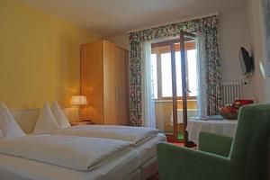 Łóżko lub łóżka w pokoju w obiekcie Hotel - Restaurant Gosauerhof