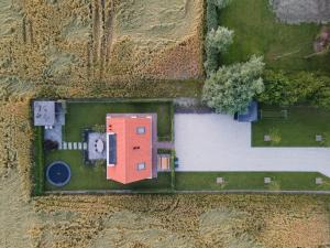 an overhead view of a farm with a red building at NIEUW Landzicht in Serooskerke