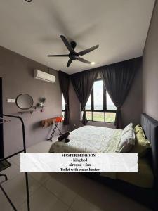 a bedroom with a bed and a ceiling fan at Alisha Homestay at Residensi KLIA near KLIA AIRPORT,SEPANG CIRCUIT,USIM,BANDAR ENSTEK in Nilai +29 photos