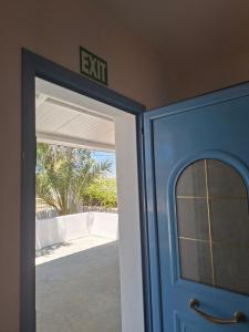 an exit sign above the door of a house at Casa de Playa in Salamina