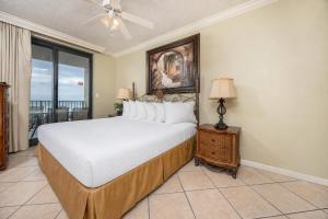 a bedroom with a large bed and a window at Phoenix X 211 condo in Orange Beach +44 photos