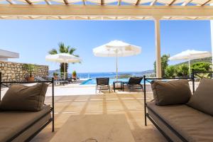 a living room with a view of the ocean at Villa Yakamoz in Kalkan