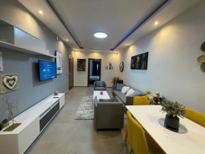 a living room with a couch and a table at Mamelle in Dakar